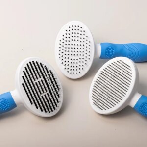 Großhandel Haustierkamm Candy Farbe One-Key-Reinigung Katzenhaarbürste Schönheit Modellierung Reinigung automatische Haarkamm Produkte