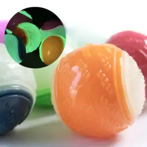 Close-up of textured, colorful rubber balls, with an inset showing them glowing in the dark.
