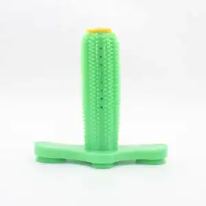 Cactus-shaped dog chew toy with textured surface, upright on flat base.