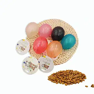 Six colorful brushes, a pile of dog food, and two round labels on a straw mat.