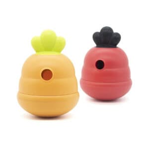 Two carrot-shaped treat toys—one orange/green, one red/black—each with front holes, shown on a white background.