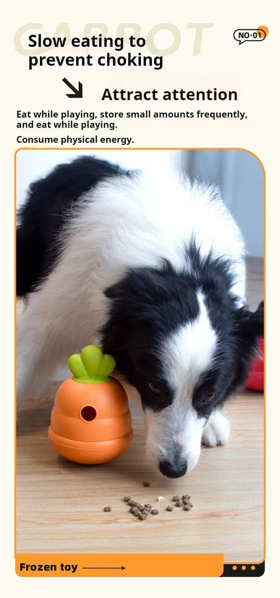 A black and white dog eats kibble next to a Carrot Dog Toy Treat Dispenser that encourages slow eating and play.
