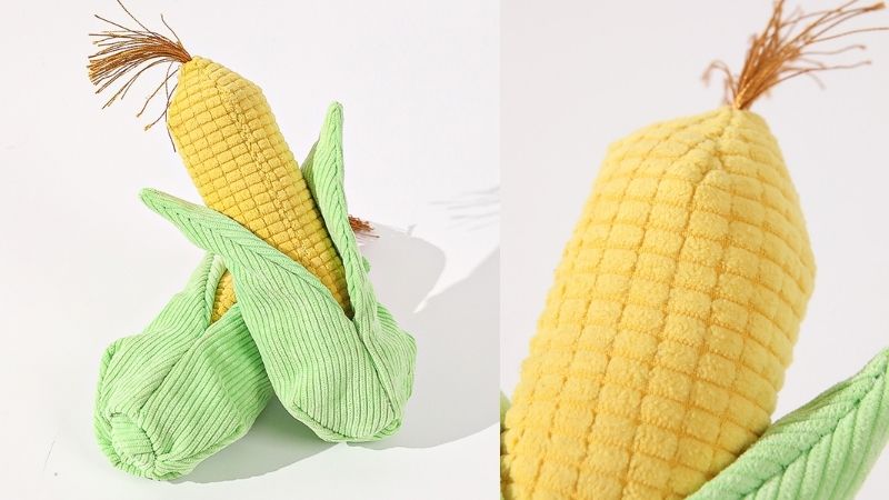 Plush corn toy with green husks and yellow kernels, shown from two angles on a white background.