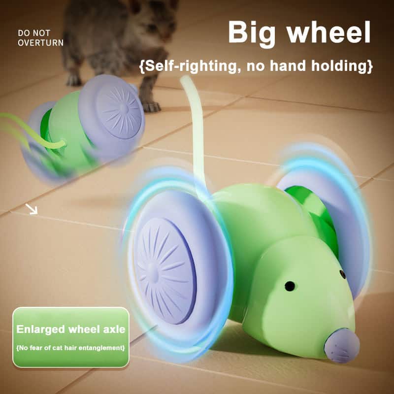 Green and purple electric mouse cat toy with big wheels rolls on tile floor as a cat watches in the background.