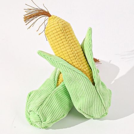 Golden corn plush toy with green leaf details, soft and playful kitchen or home decor accent.