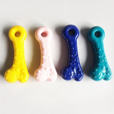 Brightly colored silicone teething toys in yellow, pink, blue, and teal designed to comfort and soothe babies during teething. Safe, soft, and easy for little hands to grasp.