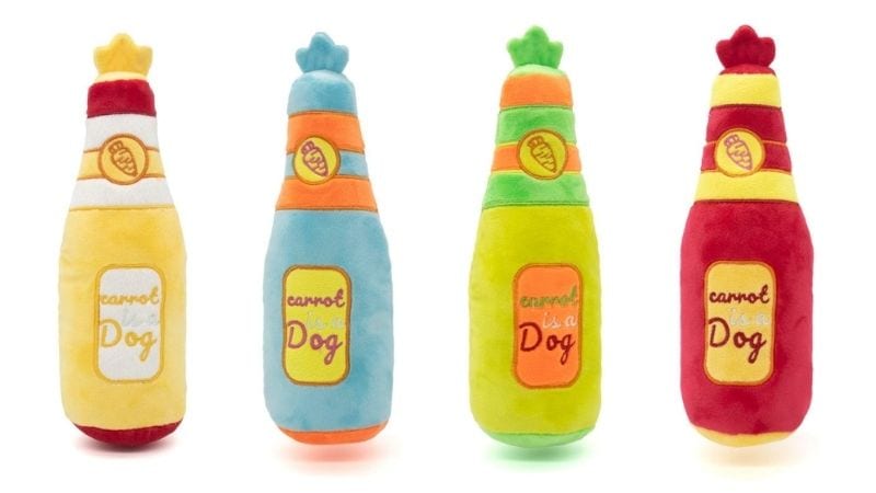 Brightly colored plush dog toy bottles with embroidered labels and playful designs, perfect for your pet's entertainment and comfort. Soft, durable, and ideal for cuddling and playtime.