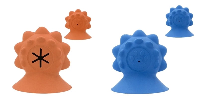 Colorful puppy chew toys in orange and blue, designed to soothe and entertain puppies during training. These durable rubber toys help reduce crying and promote healthy chewing habits.