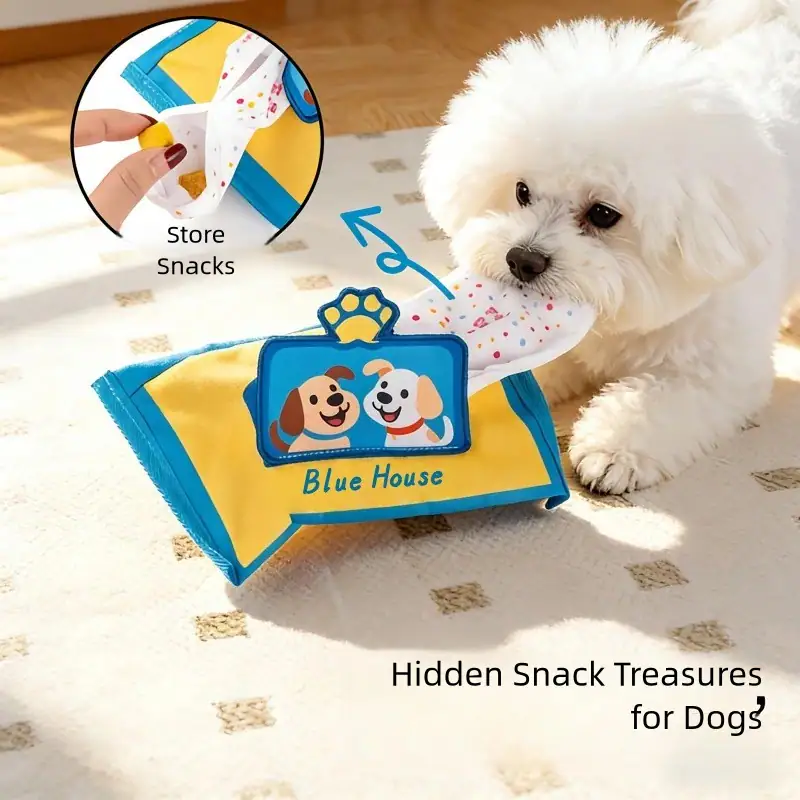 Cute white dog playing with a colorful toy bag containing hidden snacks for dogs, featuring a playful design with cartoon dogs and a paw print.