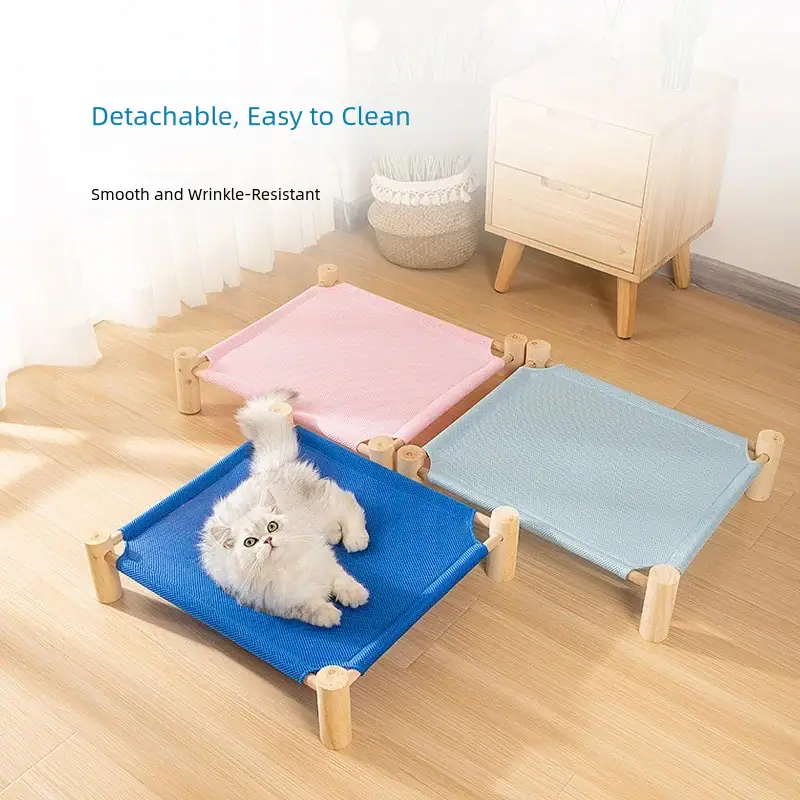 Colorful detachable cat beds in pink, blue, and light blue with a cute white kitten lying on the blue bed, showcasing easy-to-clean and wrinkle-resistant features.